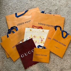 9 Louis Vuitton 1 Gucci shopping bags